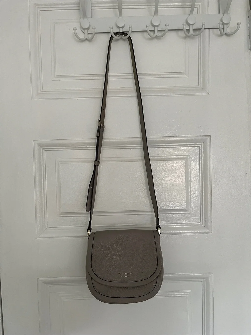 Kate Spade taupe gray pebbled leather crossbody bag